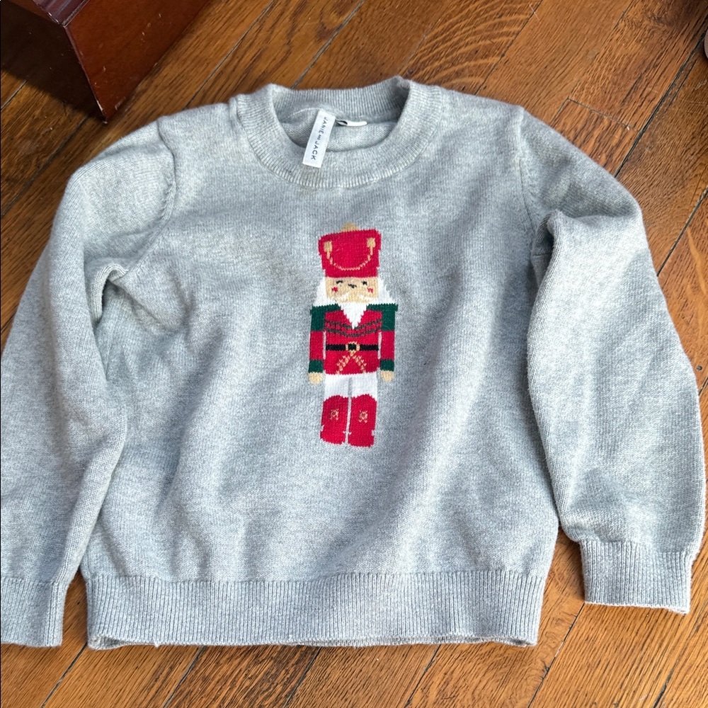 Like new Holiday Sweater with Nutcracker Design